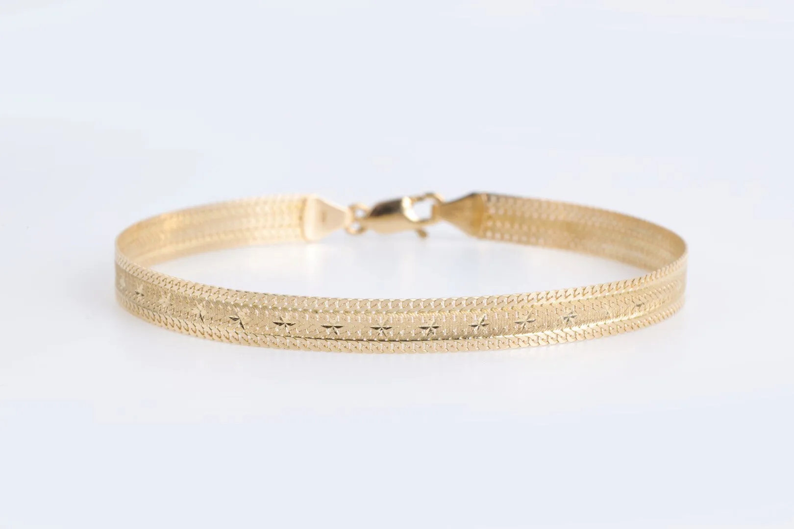 7" 14k Yellow Gold Etched Star Chain Bracelet (3.54g.)