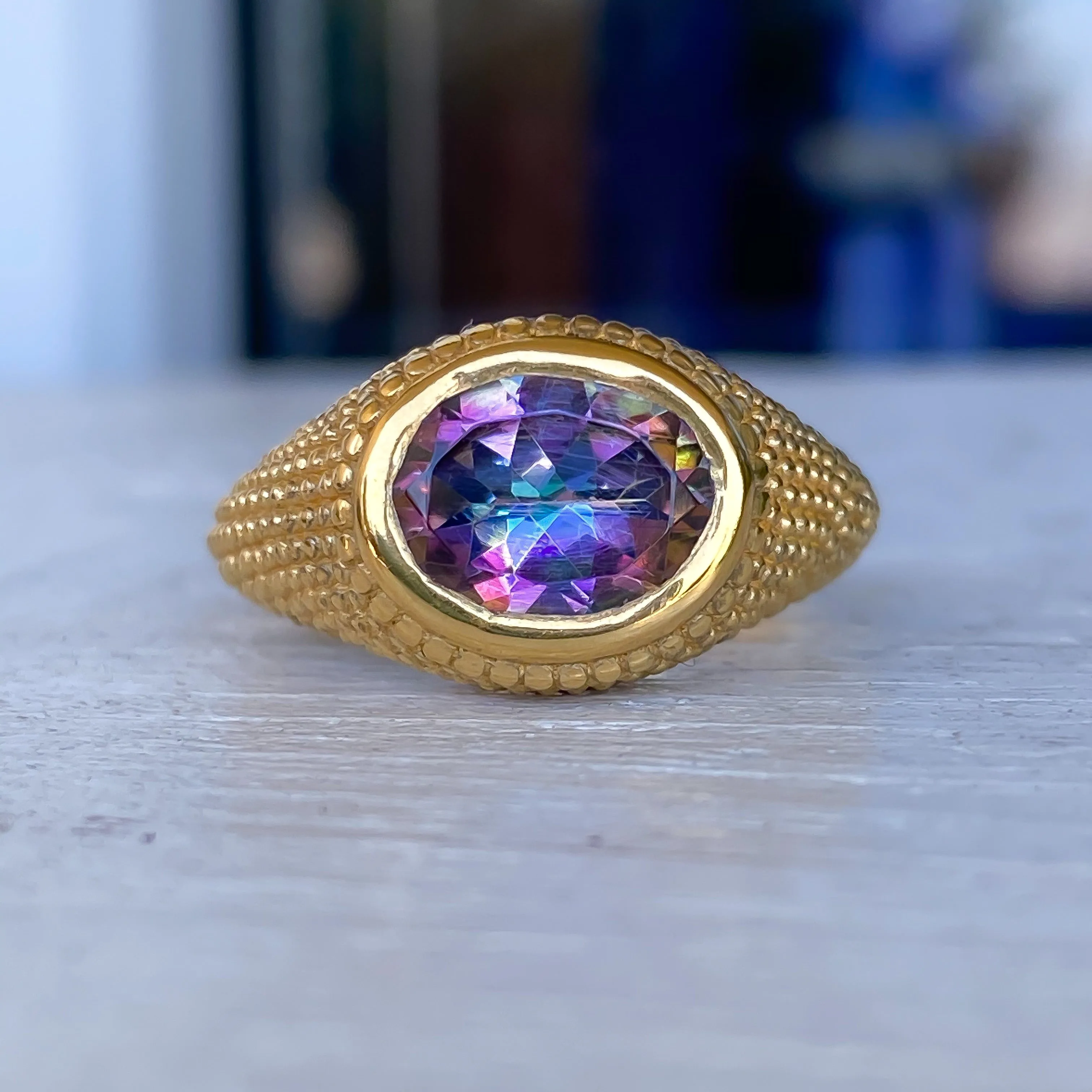 Nubia Oval Purple Mystic Topaz Yellow Gold Ring Size 7US